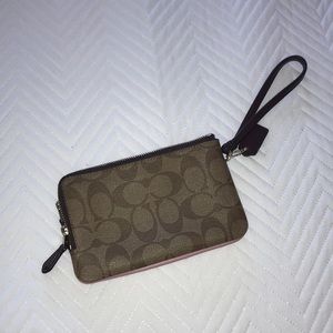 dual sided coach wristlet